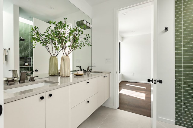 2603 Little John Ln, Austin, TX 78704 - full bath featuring double vanity and tile patterned floors