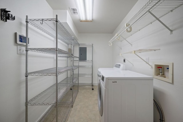 clothes washing area featuring laundry area, washing machine and dryer, and visible vents