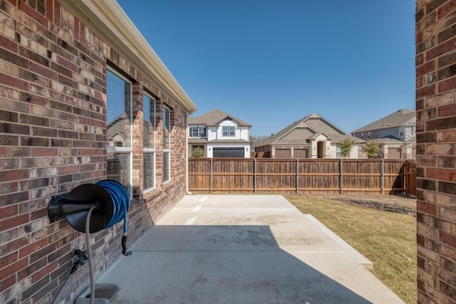 view of patio with fence