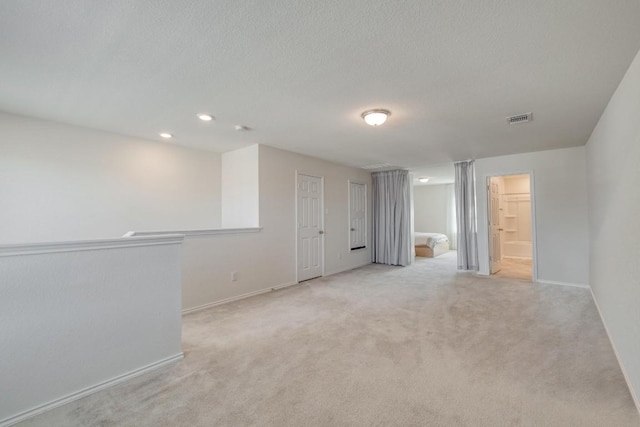 1004 Brenham Ln, Leander, TX 78641 - unfurnished room featuring light colored carpet and recessed lighting