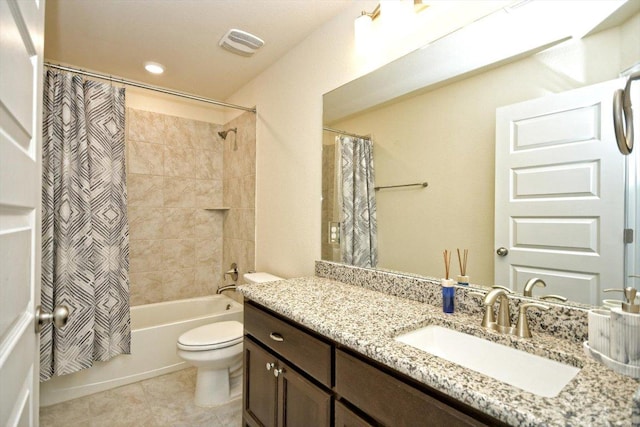 bathroom with tile patterned floors, visible vents, shower / bath combo with shower curtain, toilet, and vanity