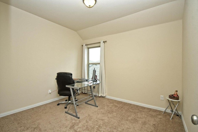 home office with baseboards, carpet, and vaulted ceiling