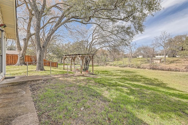 view of yard with fence