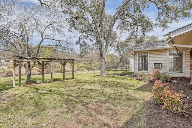 view of yard featuring a pergola and fence