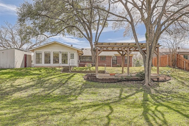 view of yard featuring a pergola and fence