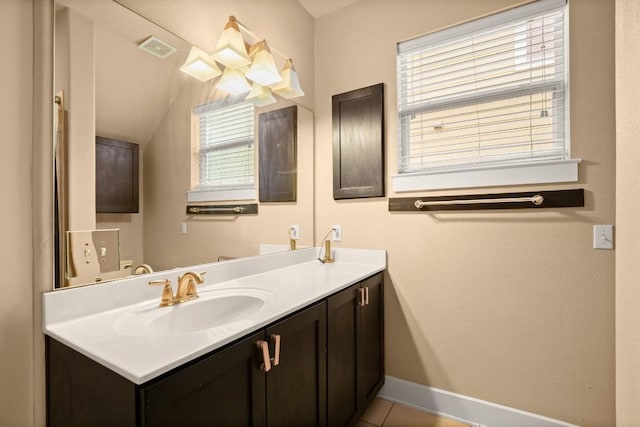 1601 Miriam Ave Unit 103, Austin, TX 78702 - bathroom with vanity and tile patterned floors