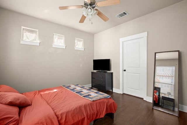 1601 Miriam Ave Unit 103, Austin, TX 78702 - bedroom with dark wood-type flooring and ceiling fan