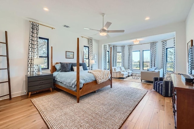 bedroom featuring recessed lighting, light wood-type flooring, and visible vents