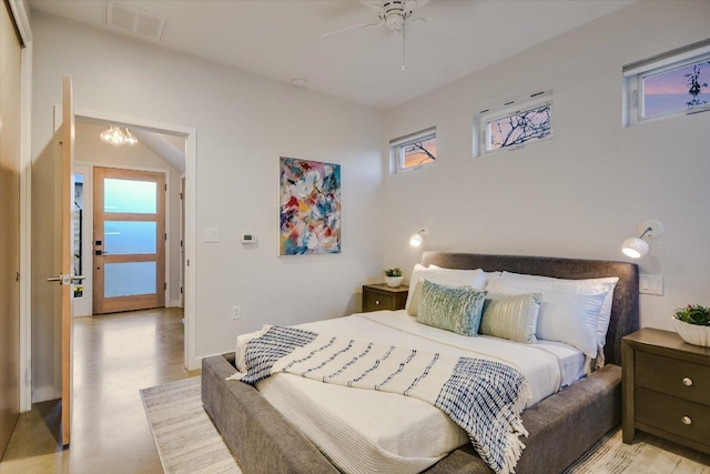 bedroom with visible vents and ceiling fan