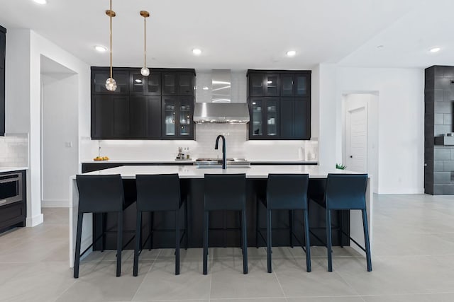 bar featuring wall chimney range hood, recessed lighting, backsplash, and pendant lighting