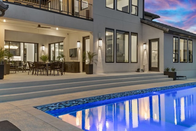 outdoor pool featuring a patio area