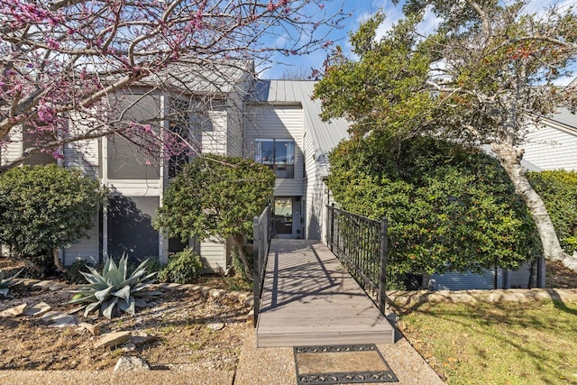 view of front of house featuring metal roof