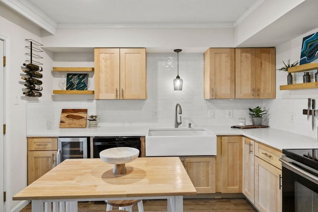 kitchen with open shelves, crown molding, wine cooler, light brown cabinetry, and a sink