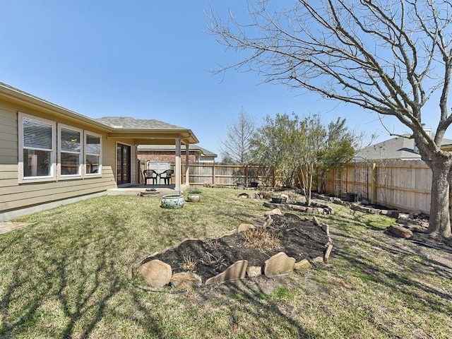 view of yard featuring a fenced backyard