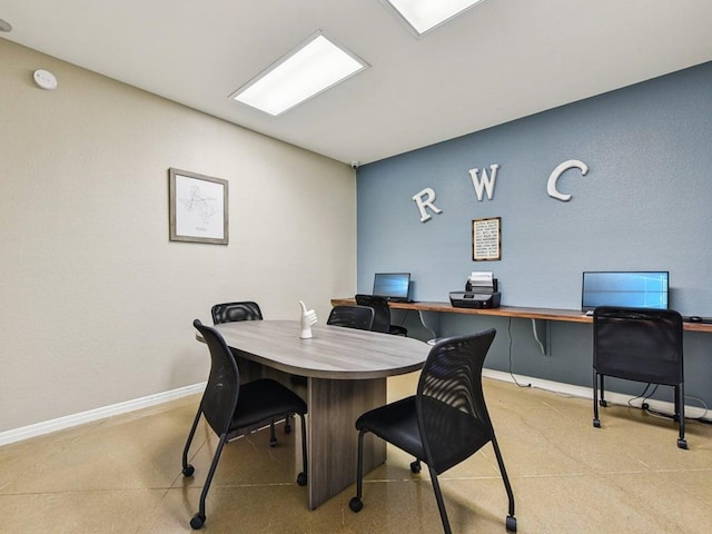 office area featuring baseboards