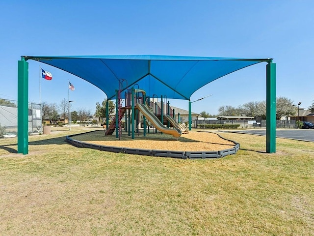 community playground featuring a yard