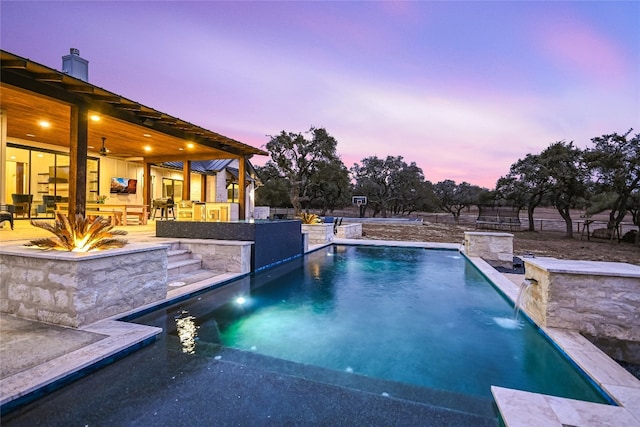 pool featuring a patio area