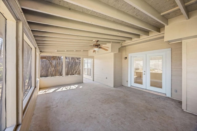 view of patio featuring french doors and fence