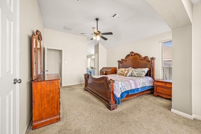 carpeted bedroom featuring visible vents, baseboards, lofted ceiling, and a ceiling fan