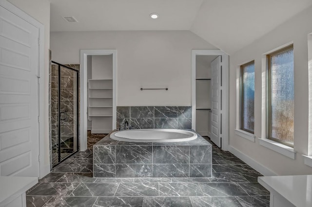 bathroom featuring visible vents, marble finish floor, and a stall shower