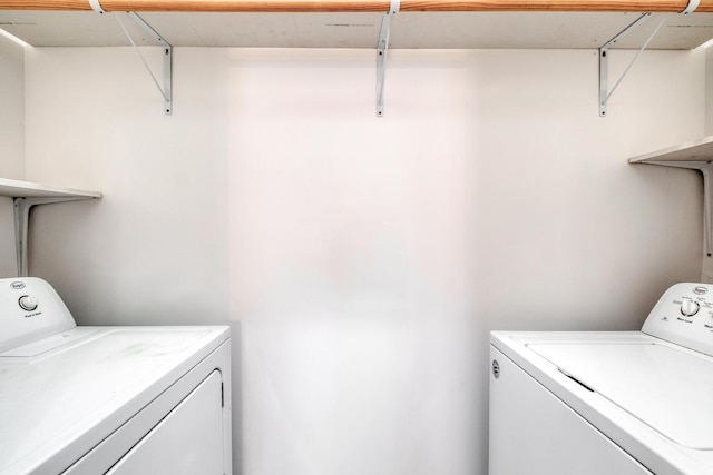 laundry area featuring washer and dryer and laundry area