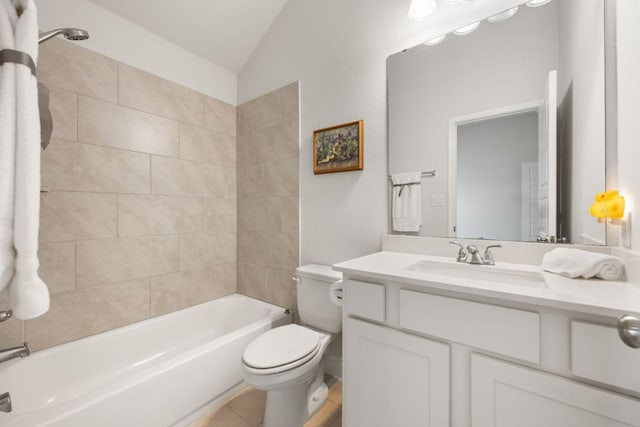 full bathroom with toilet, shower / tub combination, vaulted ceiling, tile patterned floors, and vanity