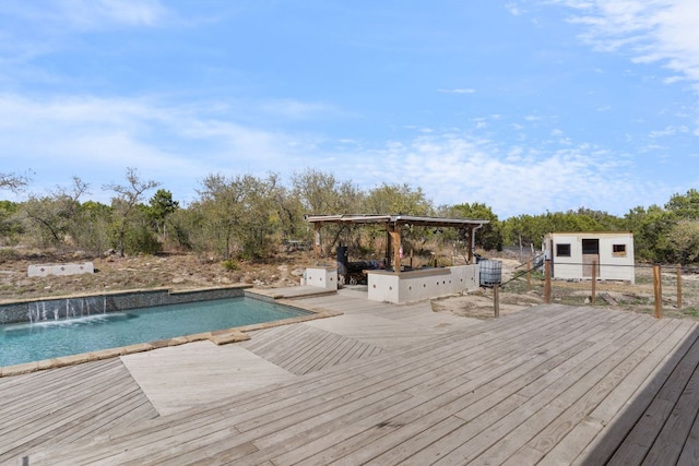 outdoor pool featuring a wooden deck