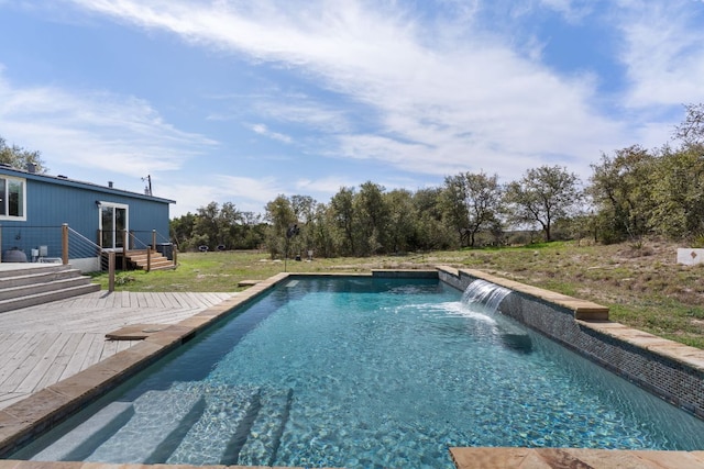 pool with a wooden deck