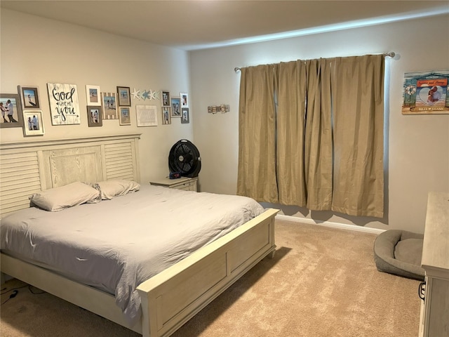 bedroom with light carpet