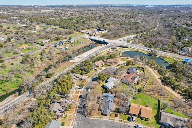 birds eye view of property with a residential view and a water view