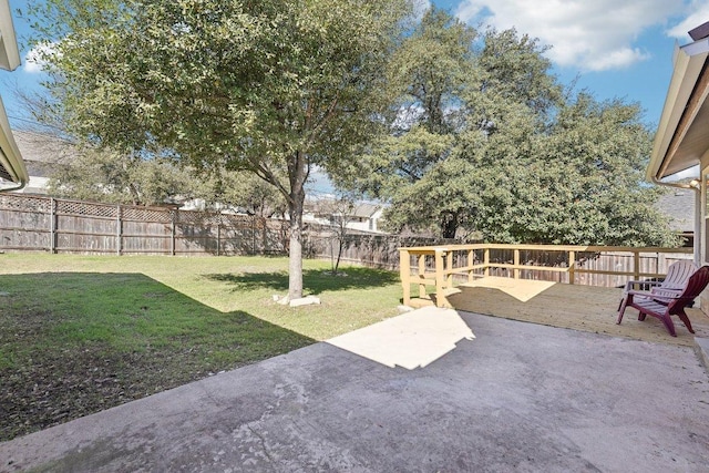 view of yard with a fenced backyard and a patio