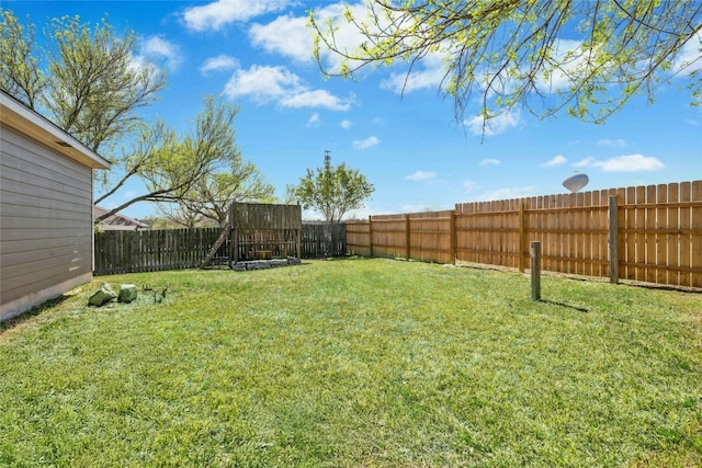 view of yard with a fenced backyard