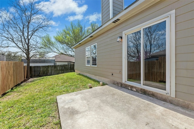 view of yard with a patio and fence