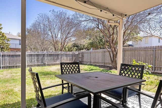 view of patio / terrace with outdoor dining area and a fenced backyard