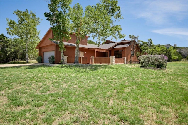 405 S Cowal Dr, Spicewood, TX 78669 - view of front facade featuring a garage and driveway