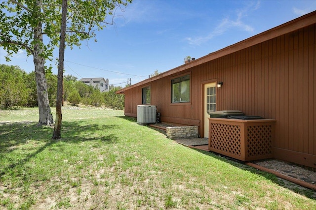 405 S Cowal Dr, Spicewood, TX 78669 - view of grassy yard featuring cooling unit