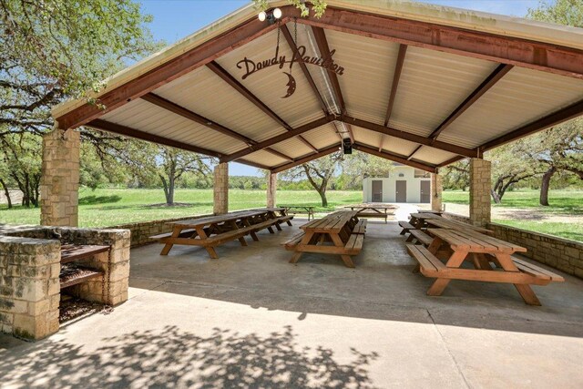 405 S Cowal Dr, Spicewood, TX 78669 - view of community featuring a patio and a yard