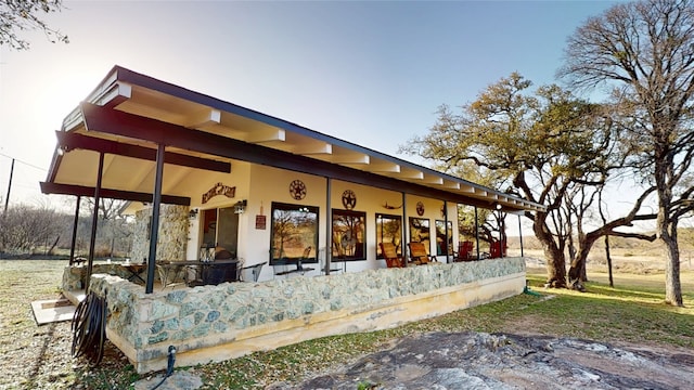 160 Lake Shore Dr, Horseshoe Bay, TX 78657 - back of property featuring stucco siding