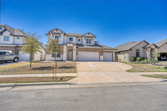 183 Concho Creek Loop, Leander, TX 78641 - view of front of house with driveway and a garage