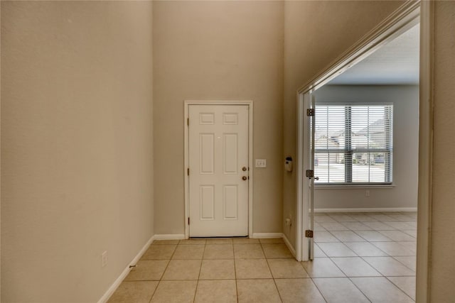 183 Concho Creek Loop, Leander, TX 78641 - foyer featuring light tile patterned floors and a towering ceiling