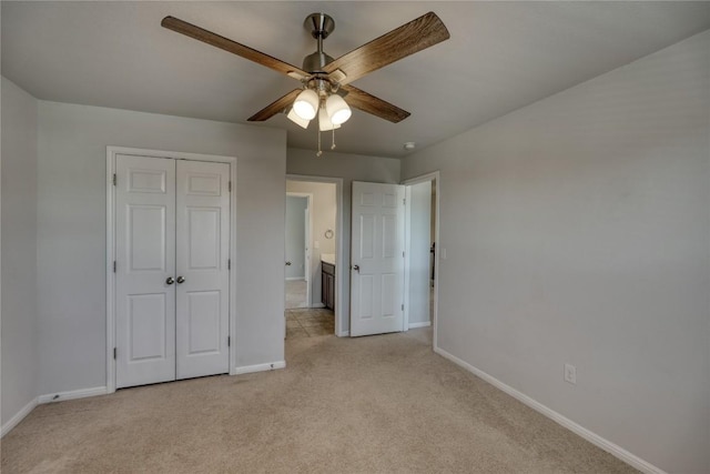 183 Concho Creek Loop, Leander, TX 78641 - unfurnished bedroom with light colored carpet, a closet, and a ceiling fan