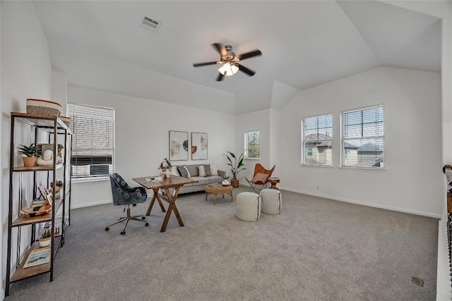 office area featuring lofted ceiling, carpet flooring, a ceiling fan, and visible vents