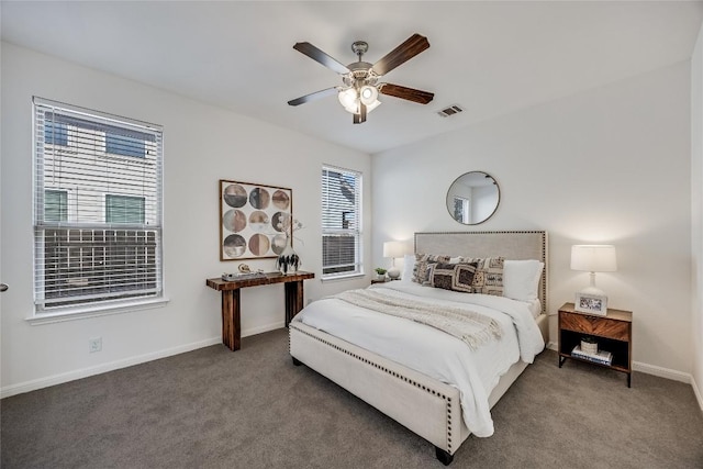 bedroom featuring ceiling fan, carpet, visible vents, and baseboards