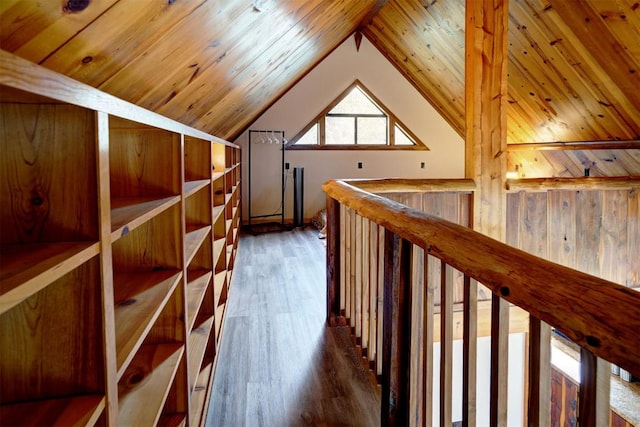 bonus room with vaulted ceiling, wood ceiling, and dark wood-style flooring