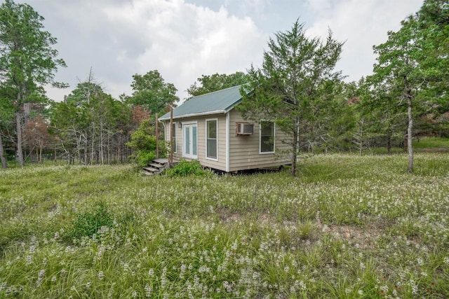 215 Lakeview Dr, Smithville, TX 78957 - view of yard featuring a wall mounted AC