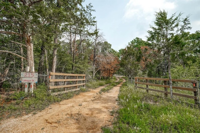 view of gate with fence