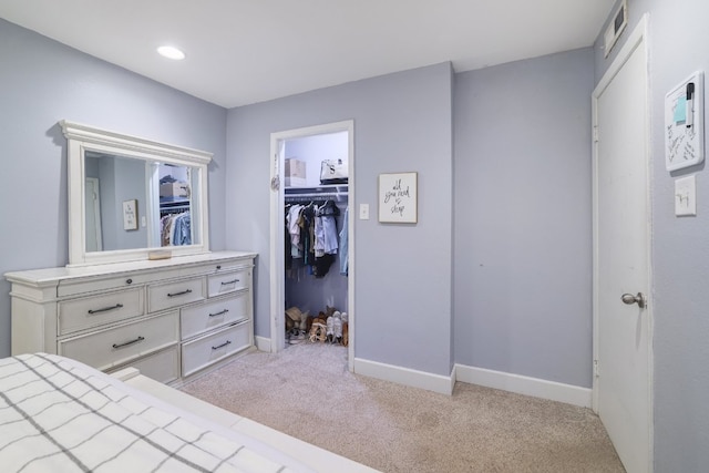 bedroom with recessed lighting, a closet, baseboards, and carpet