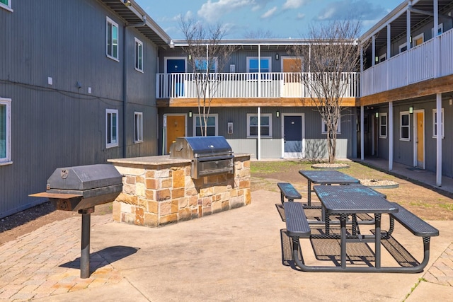 view of patio / terrace with area for grilling and an outdoor kitchen