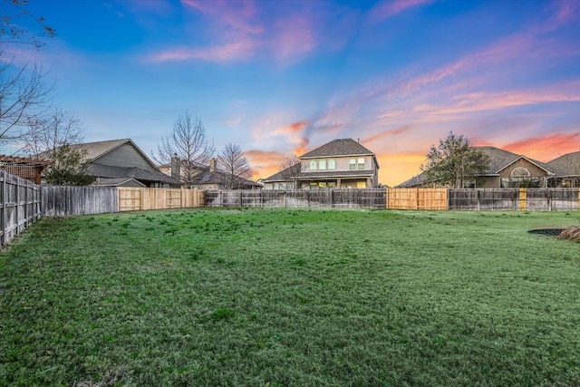 view of yard featuring a fenced backyard