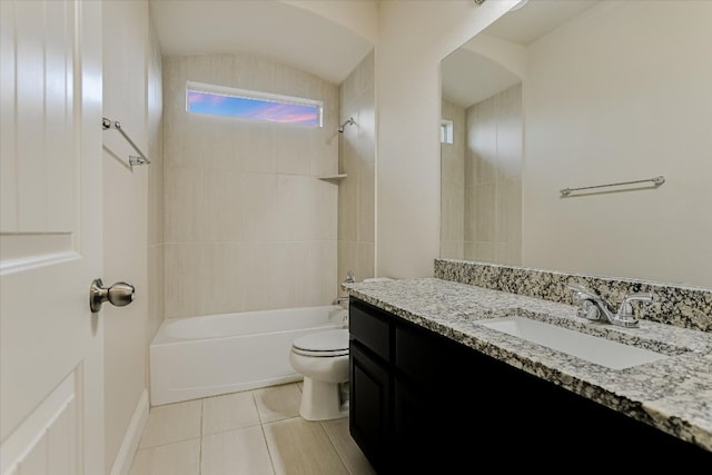 bathroom with vanity, baseboards, tile patterned flooring, shower / bathing tub combination, and toilet